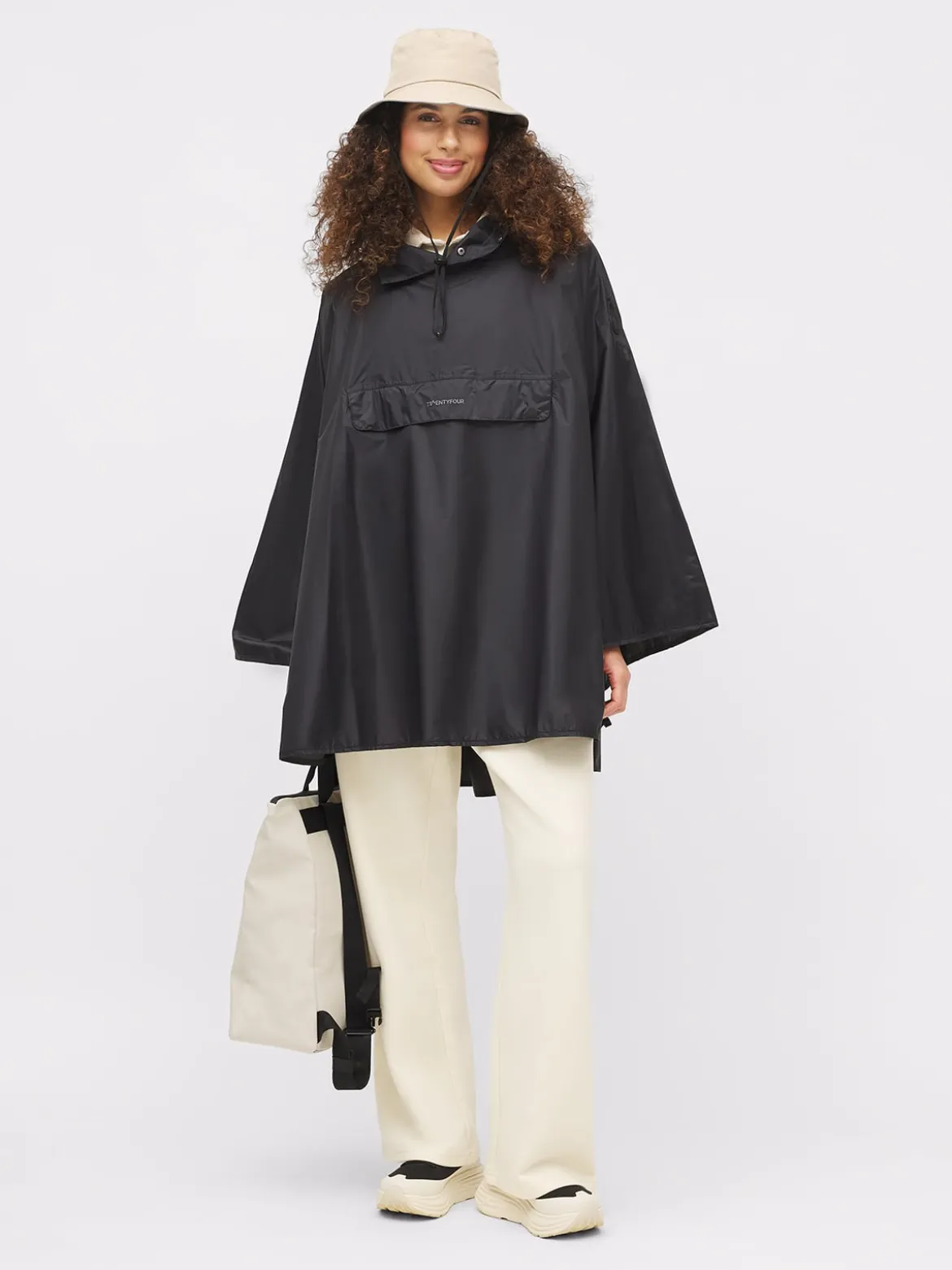 & Poncho U Vind- og vanntett poncho i unisex